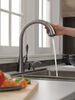 Single Handle Pull-Down Kitchen Faucet with Soap Dispenser and ShieldSpray® Technology