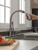 Single Handle Pull-Down Kitchen Faucet with Soap Dispenser and ShieldSpray® Technology