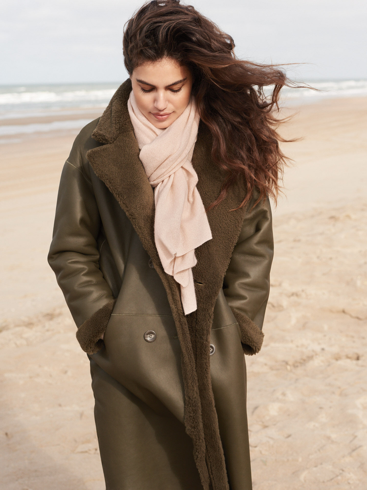 Lange omkeerbare shearling jas
