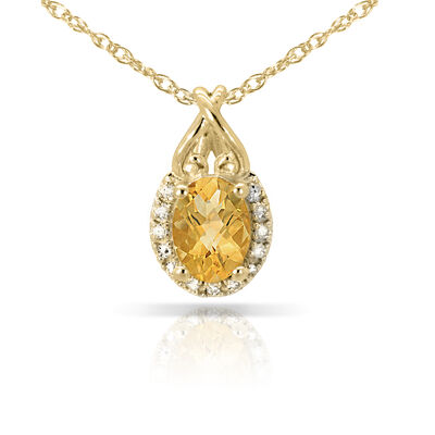 Oval Citrine & Diamond Halo Pendant in 10k Yellow Gold
