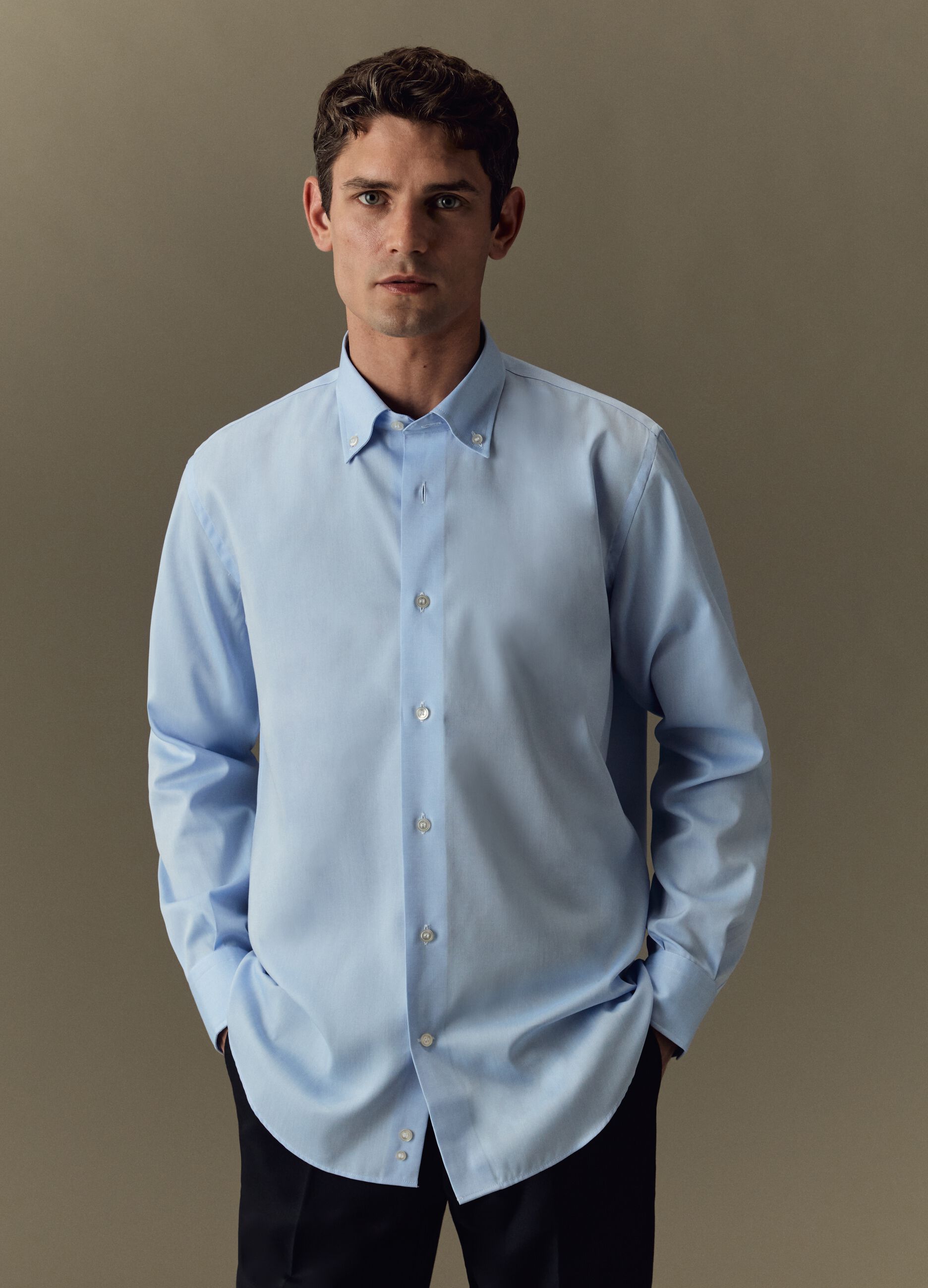 Camicia regular clearance fit significato